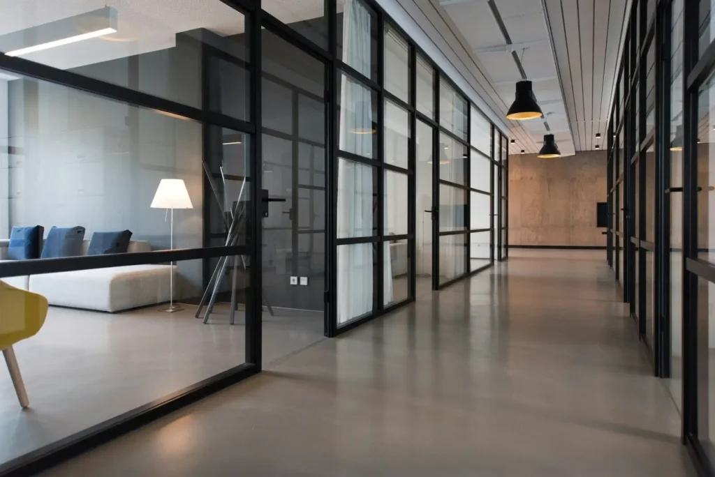 Modern office corridor with glass partition walls